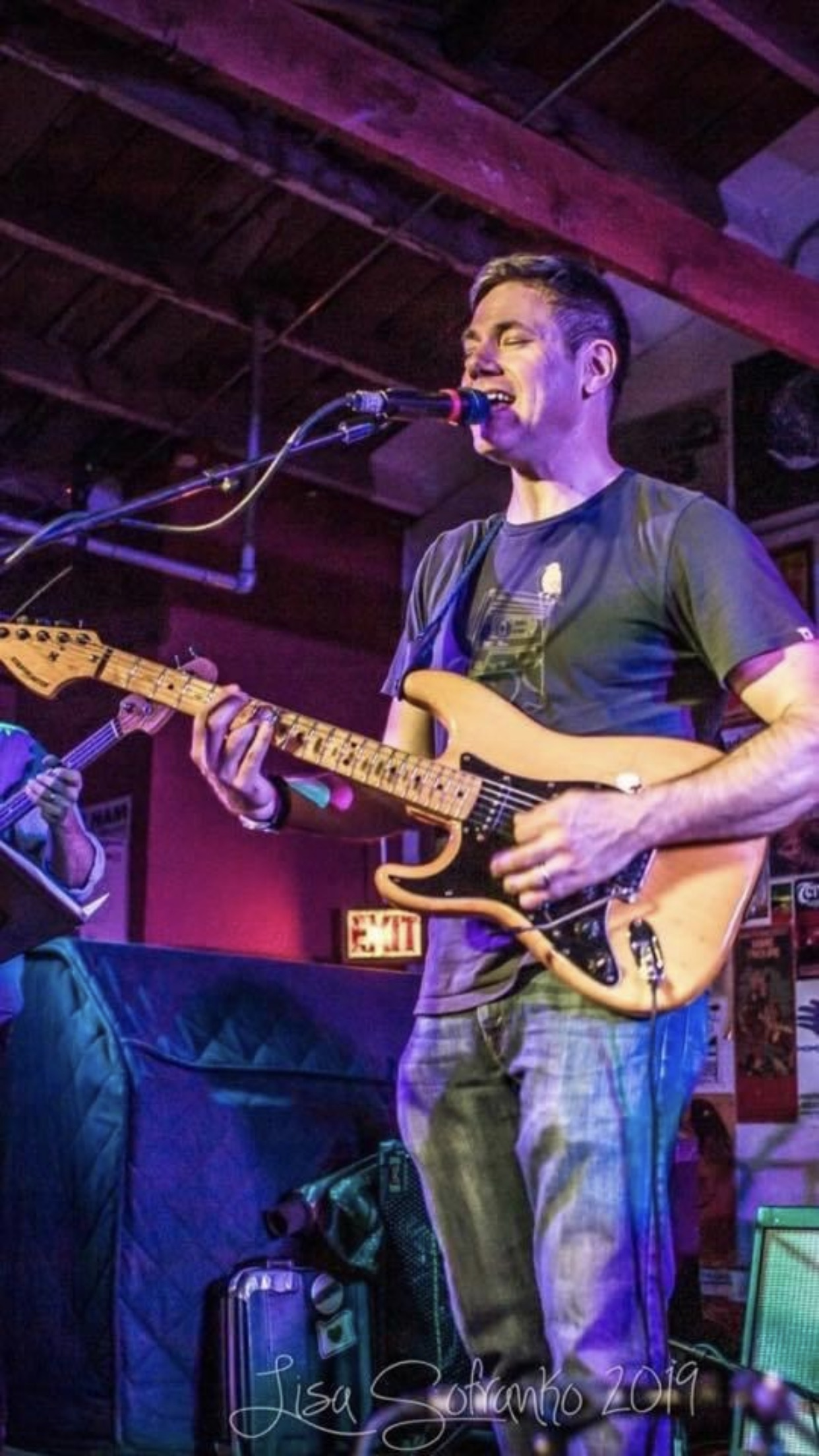Matt Lazarus with guitar